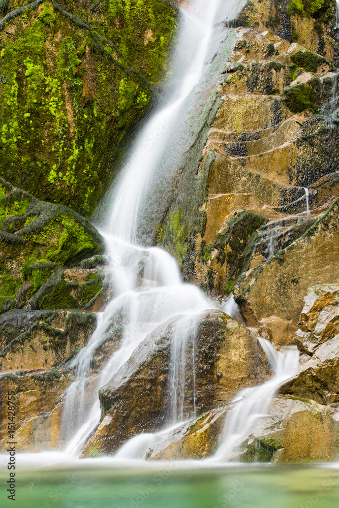 Obraz premium Emerald Water of the Torre Torrent Falls. Silk water. Tarcento, Friuli to discover