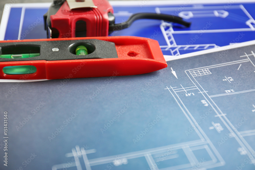 Blueprints and engineer supplies on table Blueprints and engineer supplies on table