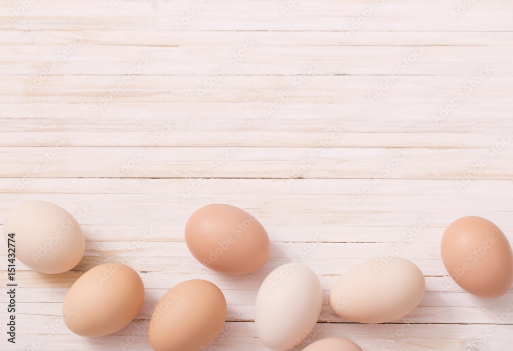 eggs on white wooden background eggs on white wooden background