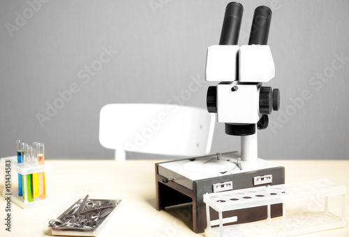 Modern microscope on table in laboratory