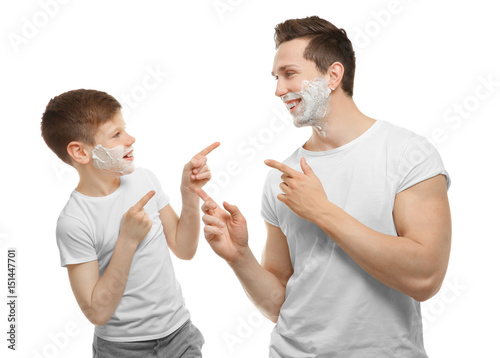 Father and son shaving on w...