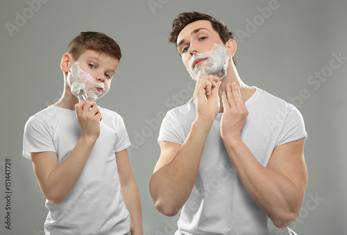 Father and son shaving on l...