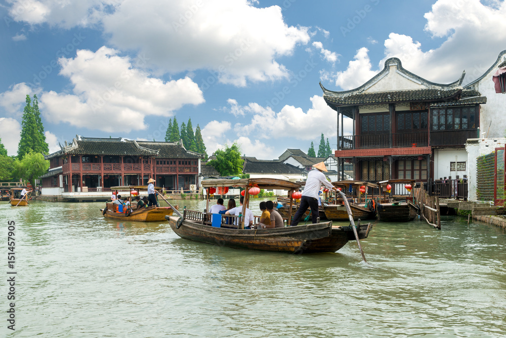 China traditional tourist boats on canals of Shanghai Zhujiajiao Water Town in Shanghai, China