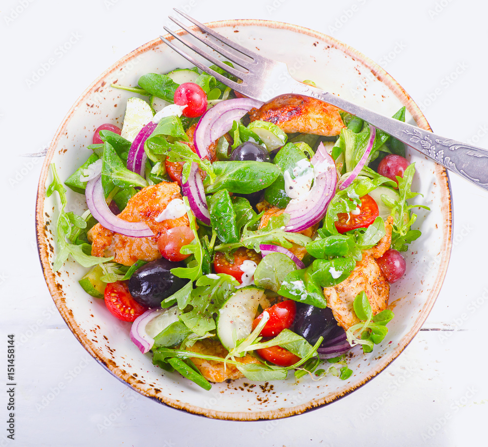 Fresh salad with chicken breast and vegetables. Healthy food. Fresh salad with chicken breast and vegetables. Healthy food.
