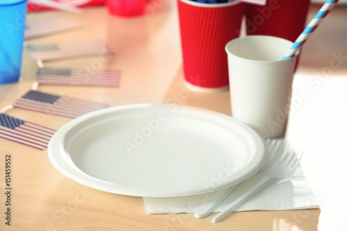 Table setting with plastic ware for summer picnic