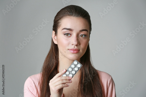 Beautiful young woman with ...