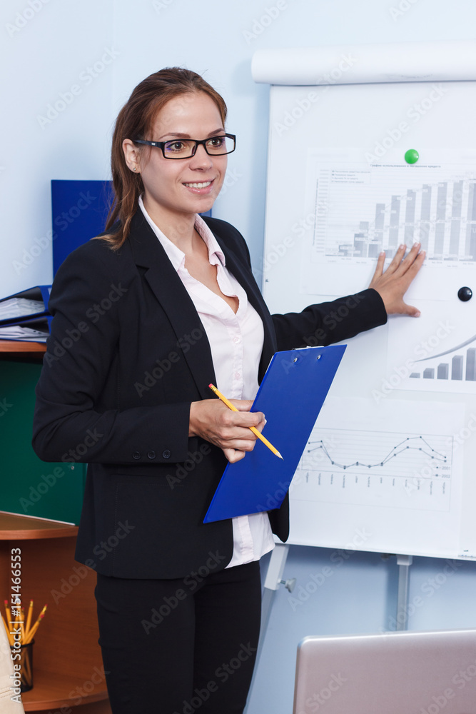 Business concept: attractive woman working in the office Business concept: attractive woman working in the office