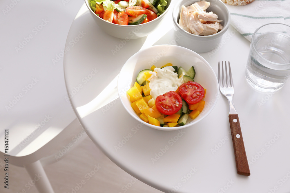 Composition with tasty yogurt on table in room