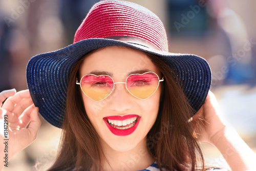 Beautiful young woman with ...
