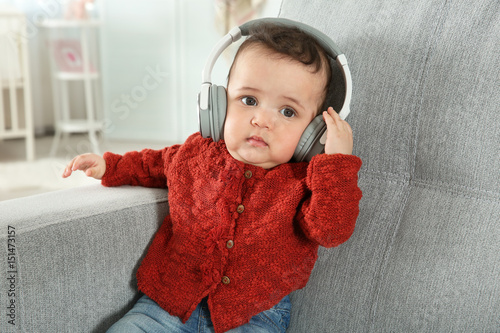 Cute little baby with headp...