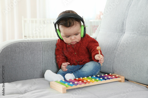Cute little baby with headp...