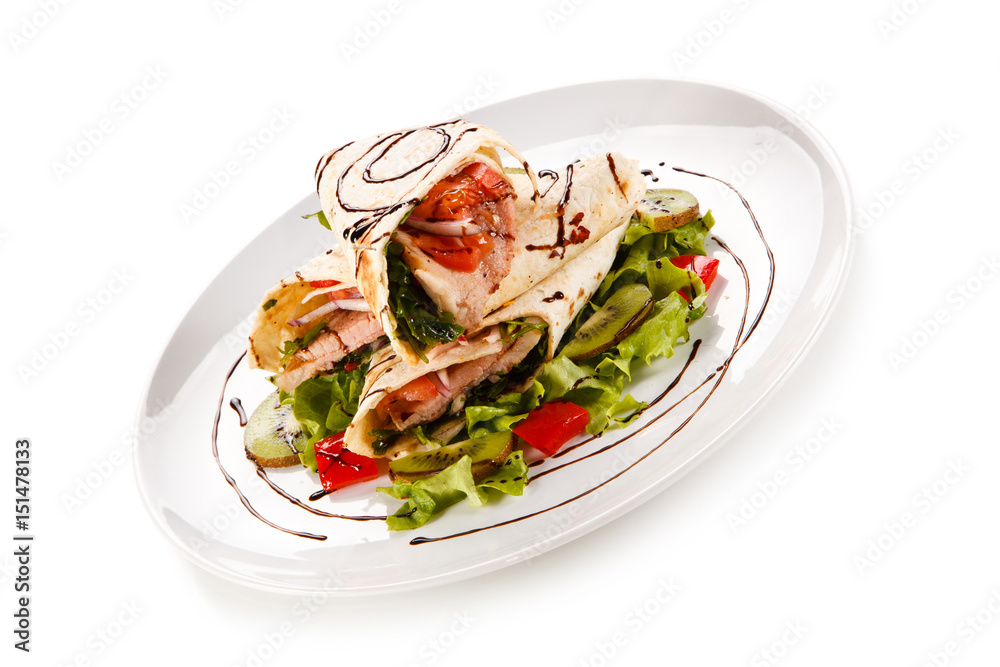 Spring rolls - meat and vegetables on white background Spring rolls - meat and vegetables on white background