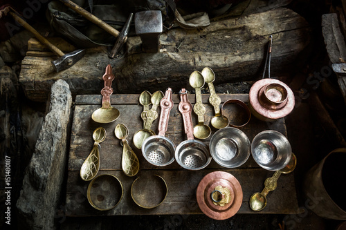 Traditional Tibetan copper handicraft products in a workshop in Chilling village in the Indian Himalaya. Chilling, Ladakh, India
