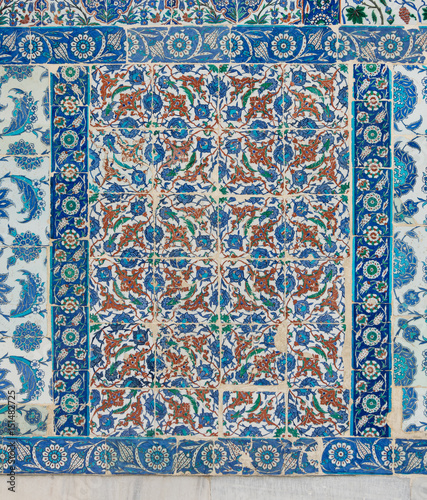  Old ceramic wall tiles with floral blue pattern in an exterior wall of the historic Eyup Sultan Mosque situated in the Eyup district, Istanbul, Turkey