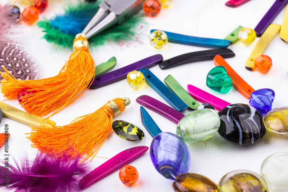 Fototapeta premium Glass beads, feathers, components
