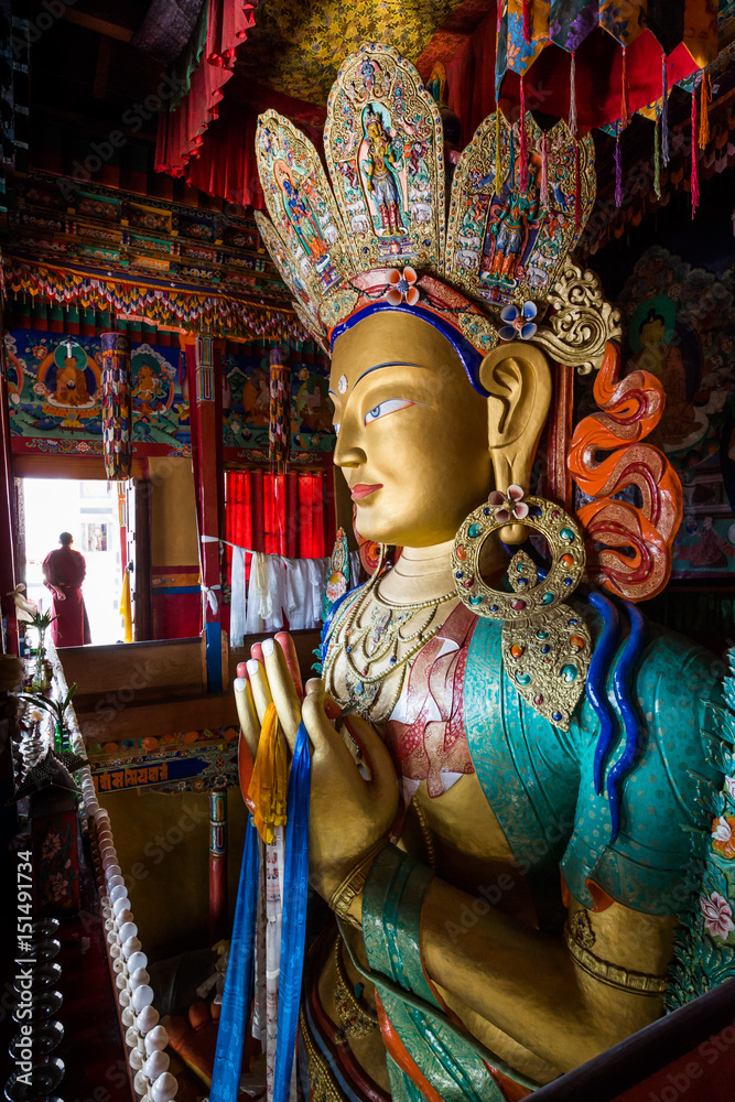 Colourful sculpture of Maitreya Buddha at Thiksey monastery in the Indian Himalaya. Thiksey, Ladakh, India