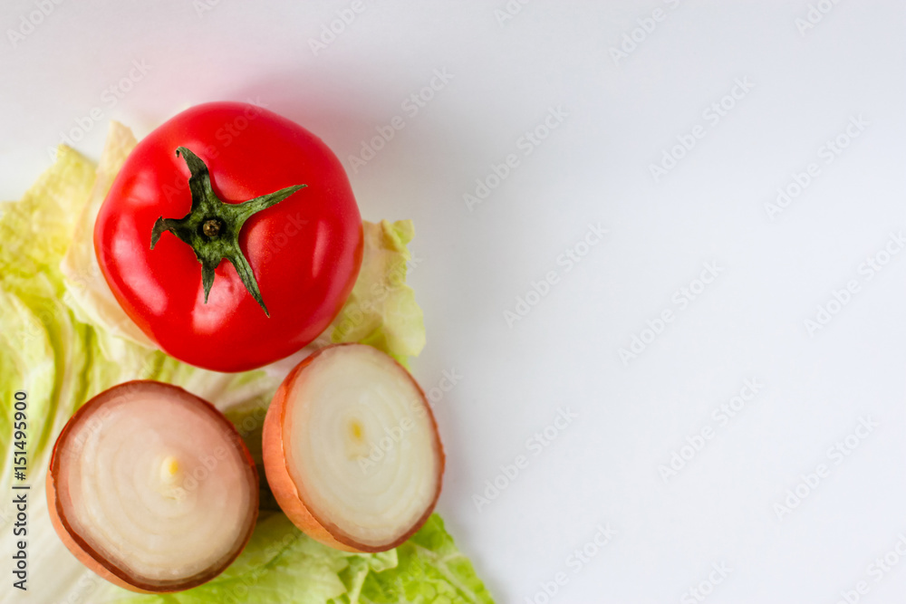 Tomato, cabbage, onion on the white background.. With place for inscription. Diet Tomato, cabbage, onion on the white background.. With place for inscription. Diet