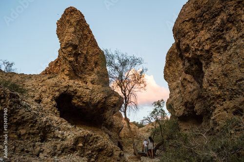 People Walking Inside Sesriem Canyon at Sunset, Sossusvlei, Namibia