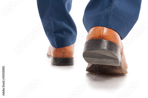 Closeup view of businessman shoes from behind