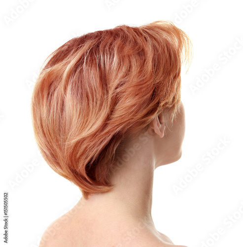 Young woman with trendy hairstyle on white background