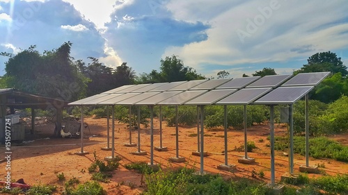 Solar panel with cloudy sky