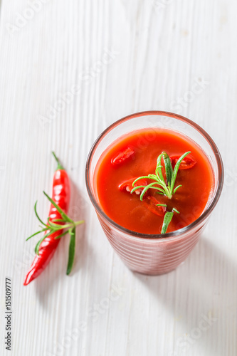 Spicy cocktail with tomatoes and chilli peppers