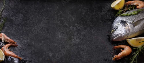 Panel kuchenny z motywem Sea food on black rustic background