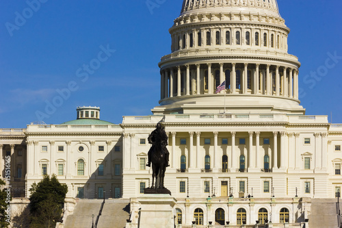 Historic view of the western-side of the classically styled United States Capitol Building with the statue of General Grant in the foreground  Capitol Hill  Washington DC
