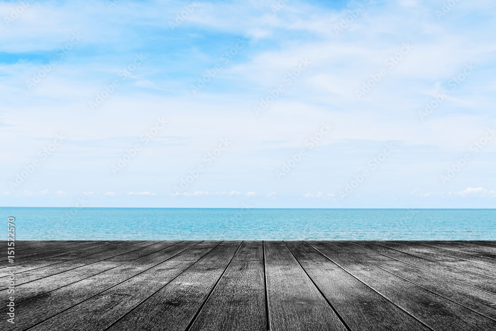 Empty wooden old surface with blurred sky and beach on the background. Empty wooden old surface with blurred sky and beach on the background.