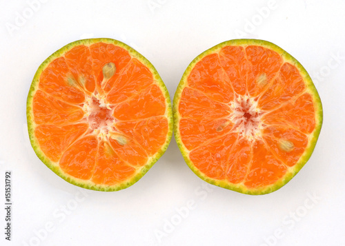  Half orange isolated on white background.