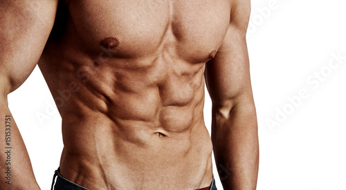 Close-up of muscular male torso isolated on white background. Concept of cross fit workout and bodybuilding. 