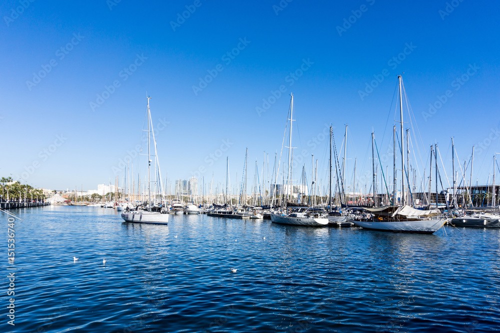Street view of Barcelona harbor with boats, Spain Europe