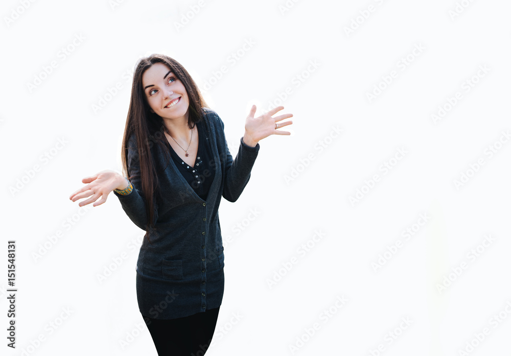 Young woman smiling and spreading her arms in both directions isolated on white background Young woman smiling and spreading her arms in both directions isolated on white background