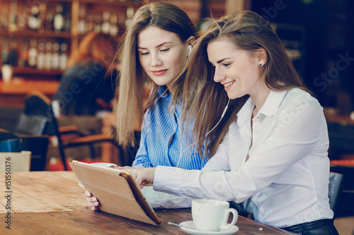 two girls in a cafe