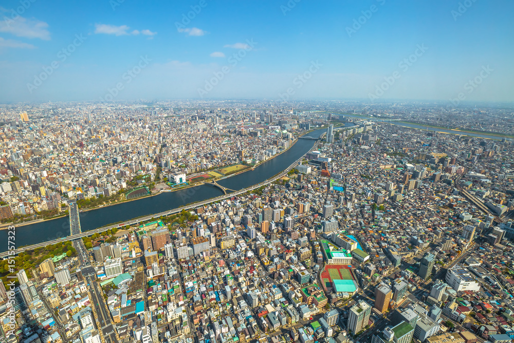 Aerial view of Tokyo city skyline, Sumida River Bridges and Asakusa area from Tokyo Skytree observatory. Daytime. Tokyo, Japan.