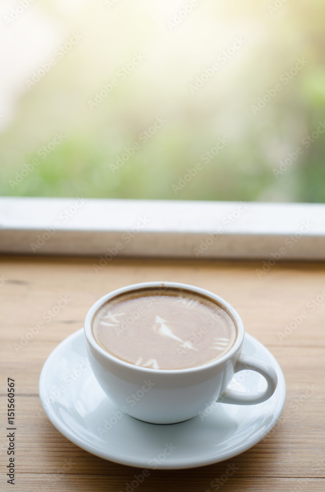 latte art coffee in green nature background latte art coffee in green nature background