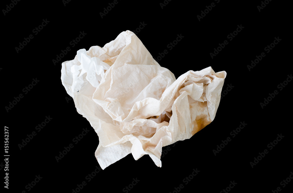 Tissue paper wraping waste food isolated on black background