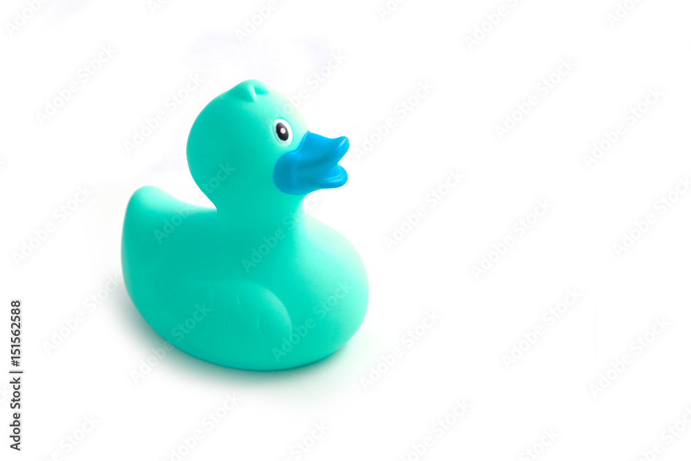 Photo depicting a green rubber duck, isolated on a white background. Children bath toy rubber ducky. Macro, close up view. Photo depicting a green rubber duck, isolated on a white background. Children bath toy rubber ducky. Macro, close up view.