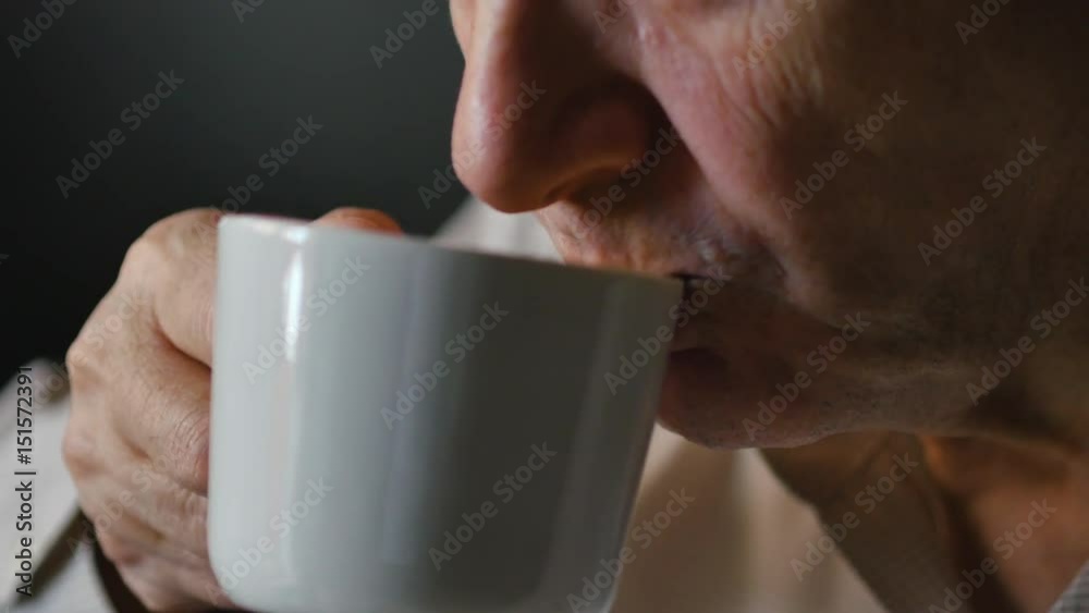 Elderly Man Drinking A Cup Of Coffee Elderly Man Drinking A Cup Of Coffee