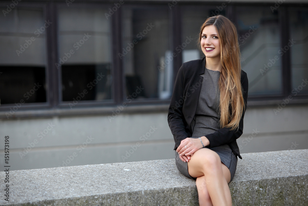 Fototapeta premium Young smiling businesswoman