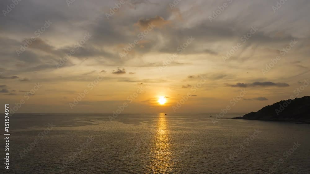 4K Timelapse of motion sunset to twilight at laem phromthep view point beach Phuket Thailand with colorful sky and fishing boat. Vacation is famous and symbol for Phuket. UHD 4K Timelapse of motion sunset to twilight at laem phromthep view point beach Phuket Thailand with colorful sky and fishing boat. Vacation is famous and symbol for Phuket. UHD