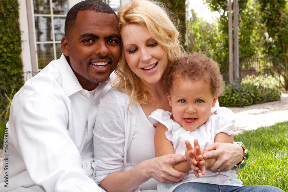 Portrait of happy multicultural family smiling. Portrait of happy multicultural family smiling.