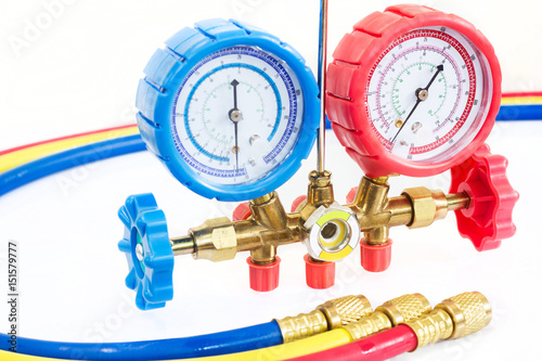 Manometers on equipment for investigate and refueling of air conditioners.