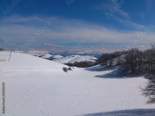 scenic view of montain whit snow and blue sky © rossano