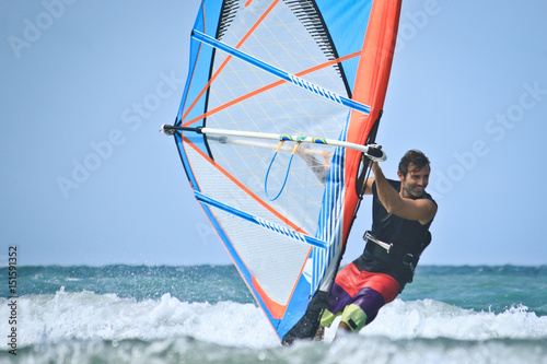 smiling happy windsurfer
