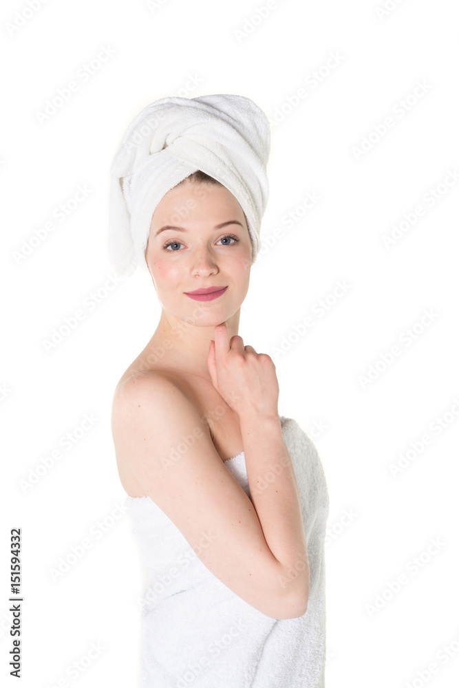 Young beautiful, pretty girl with towel. Ready for massage and skin cosmetic treatment. Studio portrait shot. Pure white background Young beautiful, pretty girl with towel. Ready for massage and skin cosmetic treatment. Studio portrait shot. Pure white background