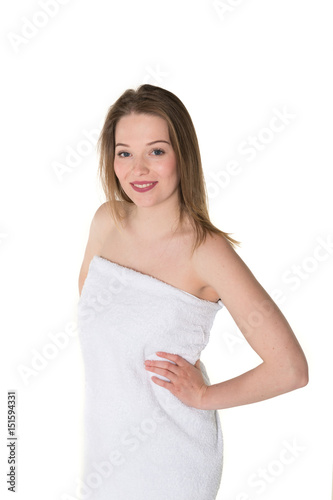 Young beautiful, pretty girl with towel. Ready for massage and skin cosmetic treatment. Studio portrait shot. Pure white background