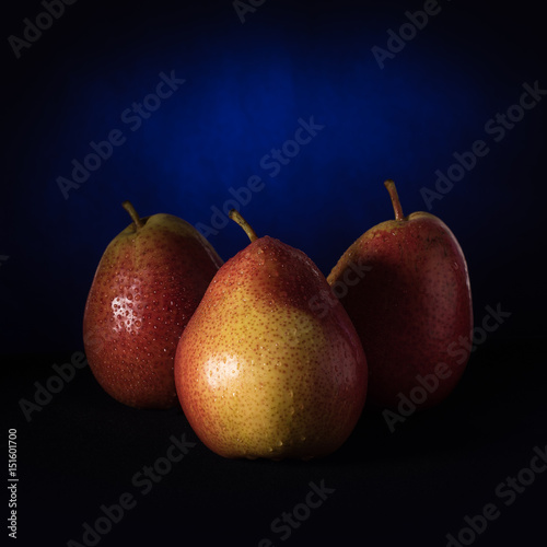 Pear red and yellow on a colored background