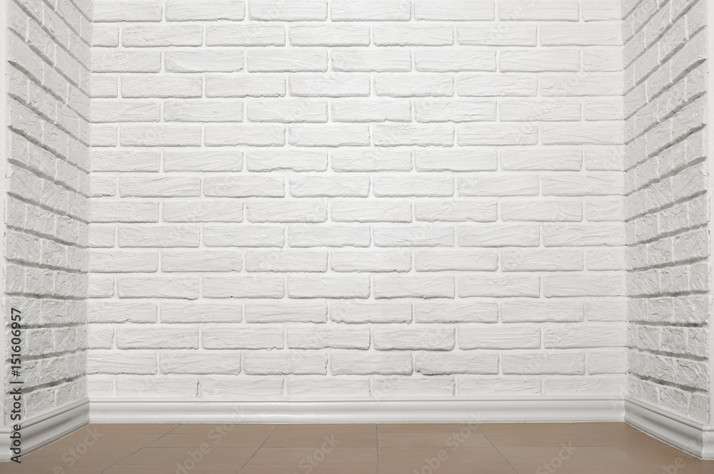 white brick wall with tiled floor, abstract background photo Stock-Foto