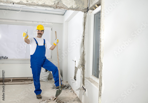 Worker at Construction Site - OK Sign   